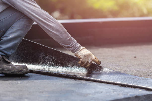 Professional Waterproofing technician working in Rockville Centre, NY